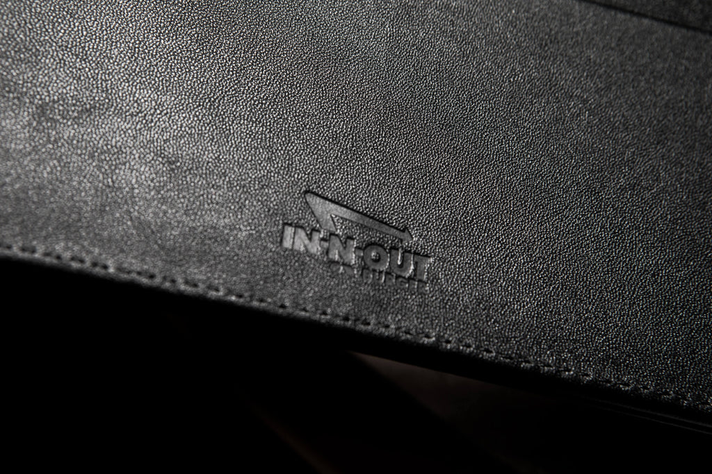 logo on LEATHER PORTFOLIO