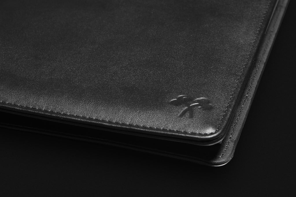 logo on LEATHER PORTFOLIO